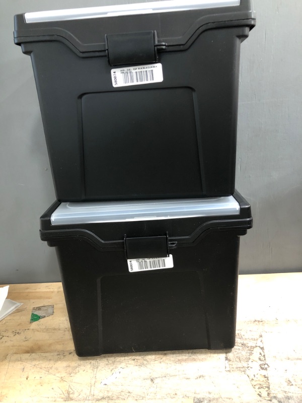 Photo 1 of two black filing bins  