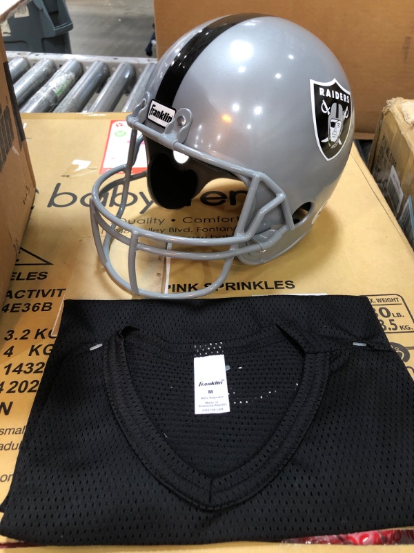 Photo 1 of FRANKLIN SIZE RAIDERS HELMET AND BLACK SHIRT