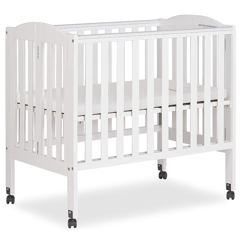 Photo 1 of Dream On Me 2-In-1 Portable Folding Stationary Side Crib In White, Greenguard Gold Certified, Two Adjustable Mattress Height Positions,Made Of Solid Pinewood, Flat Folding Crib
