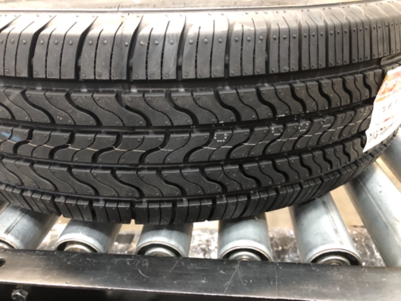 Photo 1 of 215/70R15 Firestone All Season 98T Tire, Black