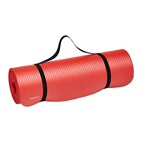 Photo 1 of Amazon Basics Extra Thick Exercise Yoga Gym Floor Mat with Carrying Strap - 74 X 24 X .5 Inches, Red
