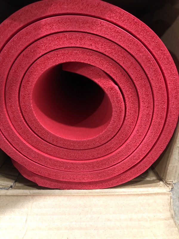 Photo 2 of Amazon Basics Extra Thick Exercise Yoga Gym Floor Mat with Carrying Strap - 74 X 24 X .5 Inches, Red
