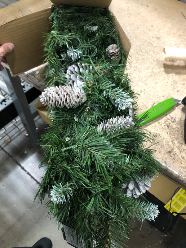 Photo 1 of 9-foot Mixed Spruce Pre-Lit Multi-Color Light Hinged Artificial Christmas Tree with Frosted Branches, Red Berries, and Frosted Pinecones

