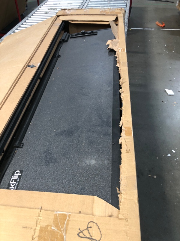 Photo 2 of ***DAMAGED - HOLES DRILLED THROUGH COVER - SEE PICTURES - LIKELY MISSING PARTS***
RealTruck BAK BAKFlip MX4 Hard Folding Truck Bed Tonneau Cover 448330 Fits 2017-2024 Ford F-250/350 Super Duty 6' 10" Bed (81.9")