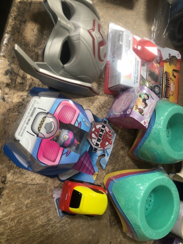 Photo 1 of ASSORTED TOYS: BOYS AND GIRLS , CUP HOLDERS, BAKUGAN , TOY CAR, MASK.