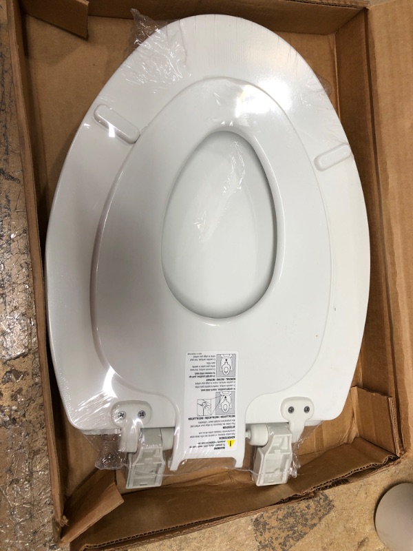 Photo 1 of **Missing Hardware**Mayfair NextStep2 Child/Adult Elongated Toilet Seat in White with STA-TITE Seat Fastening System EasyClean WhisperClose and Precision Seat Fit