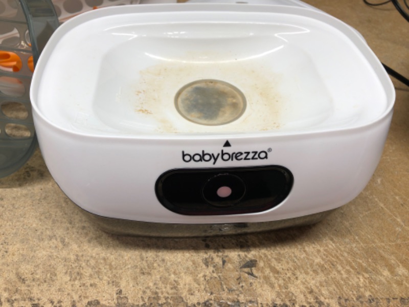 Photo 1 of Baby Brezza One Step Bottle Sterilizer – Electric Steam Sterilization – Universal Fit and Highest Capacity - Fits up to 8 Baby Bottles & 2 Sets of Pump Parts