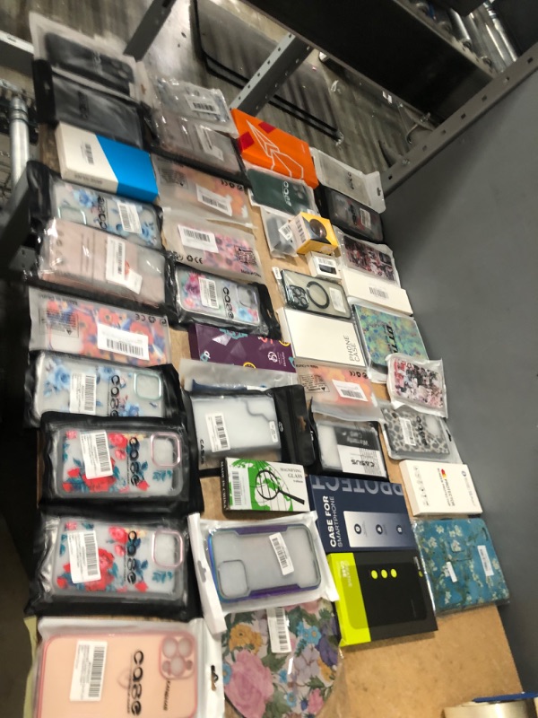 Photo 1 of BUNDLE OF ASSORTED PHONE CASES/ ELECTRONIC ACCESSORIES (40 ITEMS)