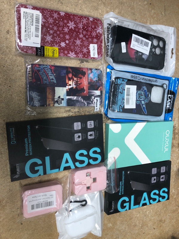 Photo 1 of MISCELLANEOUS BUNDLE OF ASSORTED PHONE CASES AND OTHER ELECTRONICAL GOODS