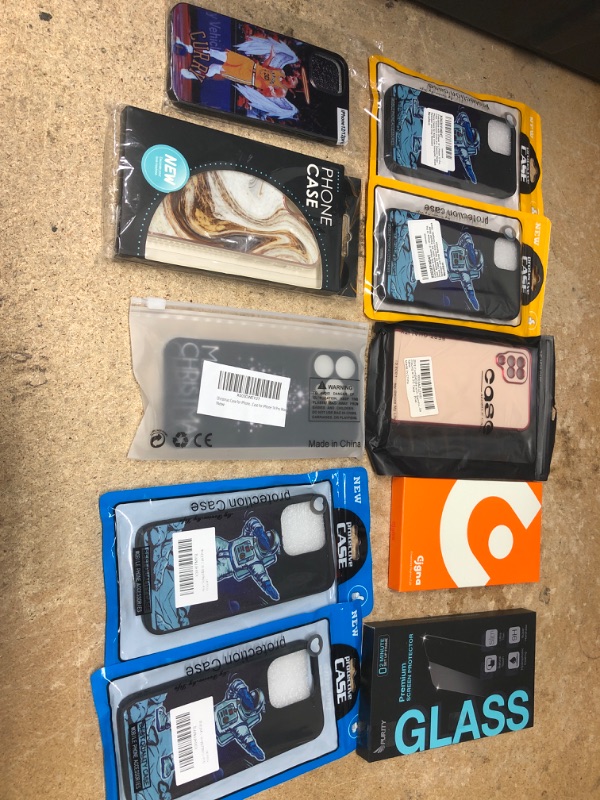 Photo 1 of MISCELLANEOUS BUNDLE OF ASSORTED PHONE CASES AND OTHER ELECTRONICAL GOODS