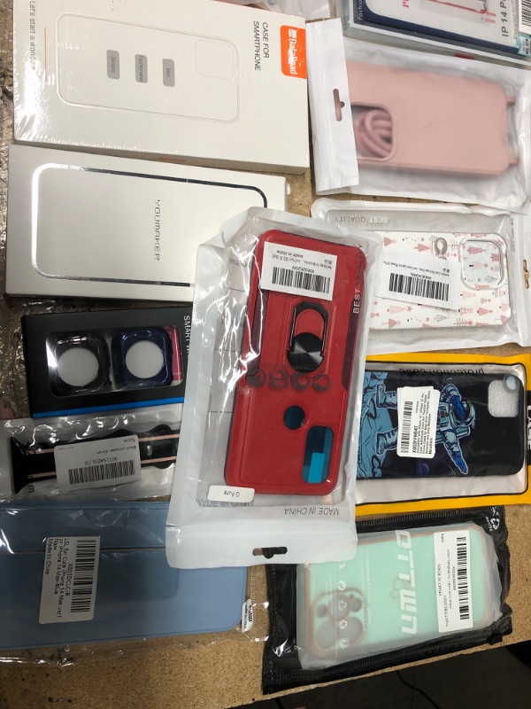 Photo 2 of MISCELLANEOUS BUNDLE OF ASSORTED PHONES CASES AND OTHER ELECTRONICAL GOODS