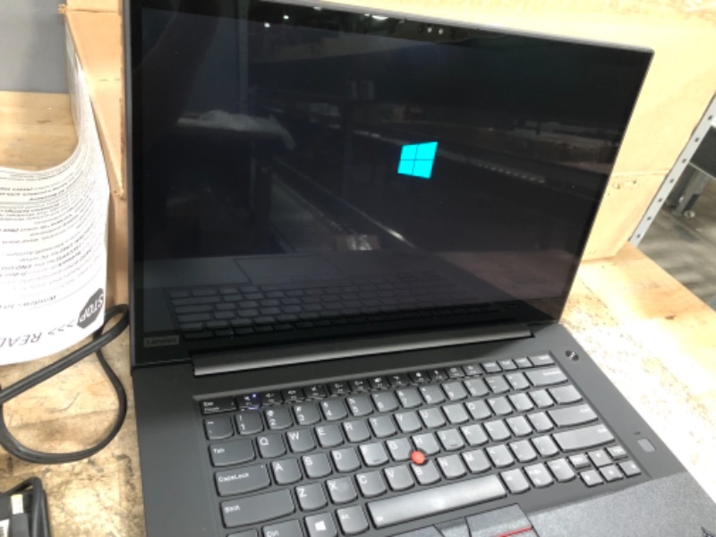 Photo 1 of Lenovo ThinkPad P1 Black Laptop (8th Generation Intel Core i7-8850H Processor, 16GB DDR4 RAM, 512GB PCIe SSD, 15.6 Touch 4K UHD (3840 x 2160), Quadro P1000 Graphics, Windows 10 Pro (Renewed)
