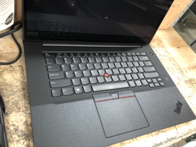 Photo 3 of Lenovo ThinkPad P1 Black Laptop (8th Generation Intel Core i7-8850H Processor, 16GB DDR4 RAM, 512GB PCIe SSD, 15.6 Touch 4K UHD (3840 x 2160), Quadro P1000 Graphics, Windows 10 Pro (Renewed)
