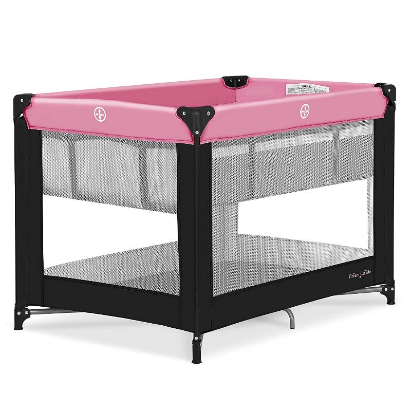 Photo 1 of Dream On Me Zazzy Portable Playard with Bassinet in Pink