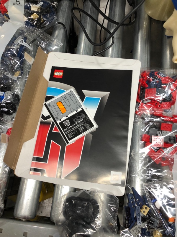 Photo 2 of LEGO Optimus Prime 10302 Building Set for Adults; Build a Collectible Model of a Transformers Legend (1,508 Pieces), 11.1 x 18.9 x 3.58 inches FrustrationFree Packaging