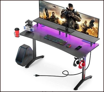 Photo 1 of SEVEN WARRIOR Gaming Desk 55INCH with LED Strip & Power Outlets,Carbon Fiber Surface Computer Gamer Desk with Full Desk Mouse Pad, Ergonomic Y Shaped Gamer Table with Outlet Organizer
