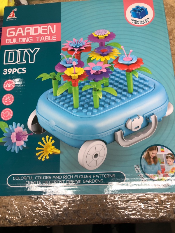 Photo 2 of ASSENIO Flower Garden Building Toys, Kids Outdoor Flower Game, Flower Toys for 3 4 5 6 Year Old Girls, Kids Plant Growing Kit with Trolley Case, Birthday for 5+ Year Old (Pink)