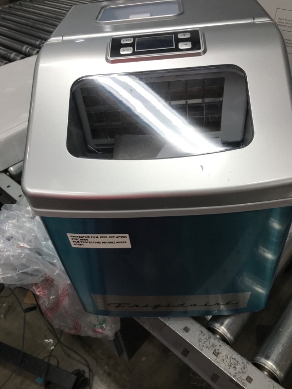 Photo 3 of ***FOR PARTS ONLY - DOES NOT FREEZE*** 
Frigidaire 40 lbs Countertop Clear Square Ice Maker - Stainless Steel