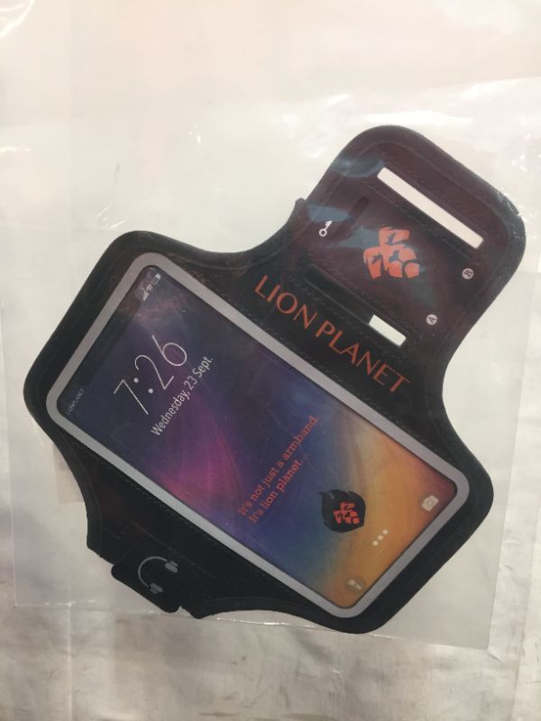 Photo 2 of Cell Phone Armband Case. for Screen Size of 6.8 inches and Below. with Card Holder, Key Slot, & Earphone Cord Holder. Wear in Running, Workout, Sports, Fitness and Gym. (Dark Black, L 6.8")
