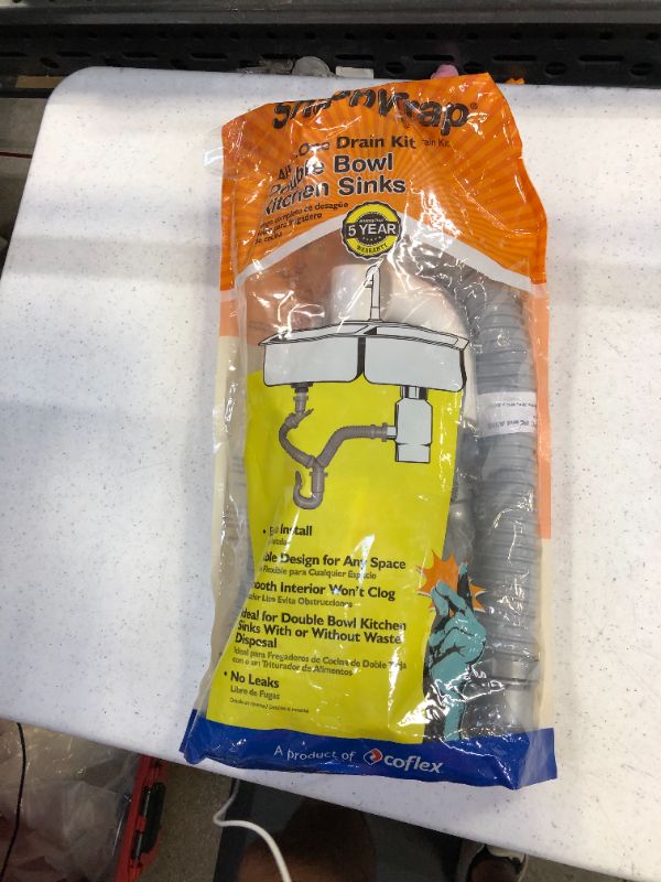 Photo 1 of Snappy Trap 1 1/2" Drain Kit for Double Kitchen Sinks