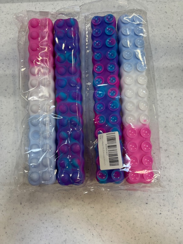 Photo 2 of 4 Pack Squidopop it Fidget Toy, Push Pop-on-it Suction Cup Straps