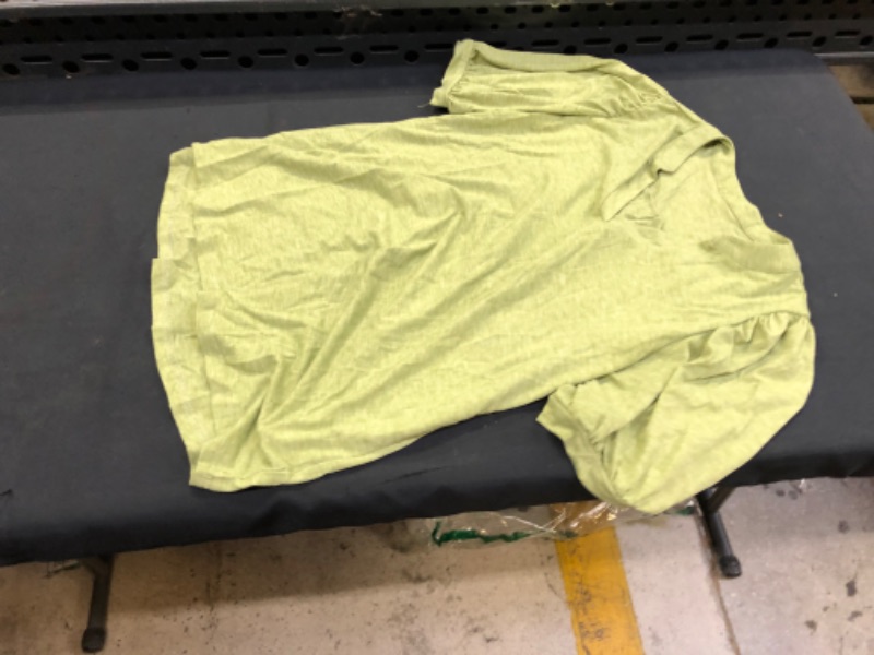 Photo 1 of women's green shirt size M