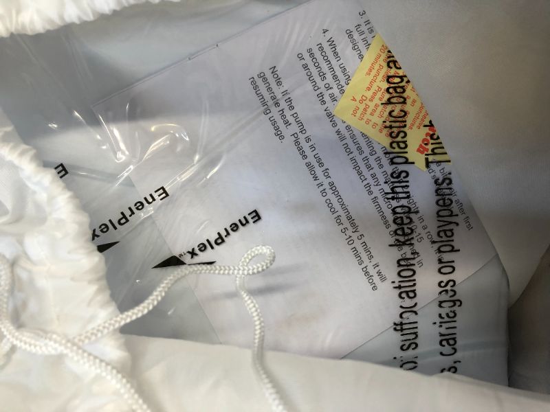 Photo 3 of EnerPlex Kids Inflatable Travel Bed with High Speed Pump, Portable Air Mattress for Kids on The Go, Blow up Toddler Travel Bed with Sides – Built-in Safety Bumper - Blue
