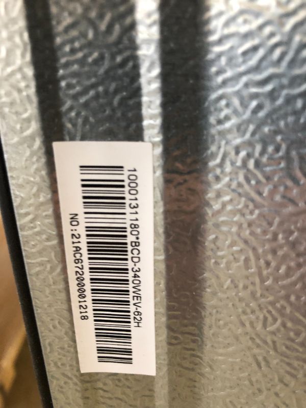 Photo 1 of Galanz GLR12TS5F Refrigerator, Dual Door Fridge, ** TOP CORNER DENTED, STENCH FROM INSIDE. Adjustable Electrical Thermostat Control with Top Mount Freezer Compartment, 12.0 Cu.Ft, Stainless Steel
