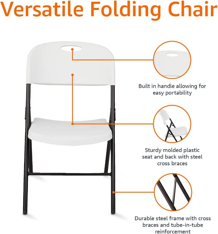 Photo 1 of Amazon Basics Folding Plastic Chair with 350-Pound Capacity  White
