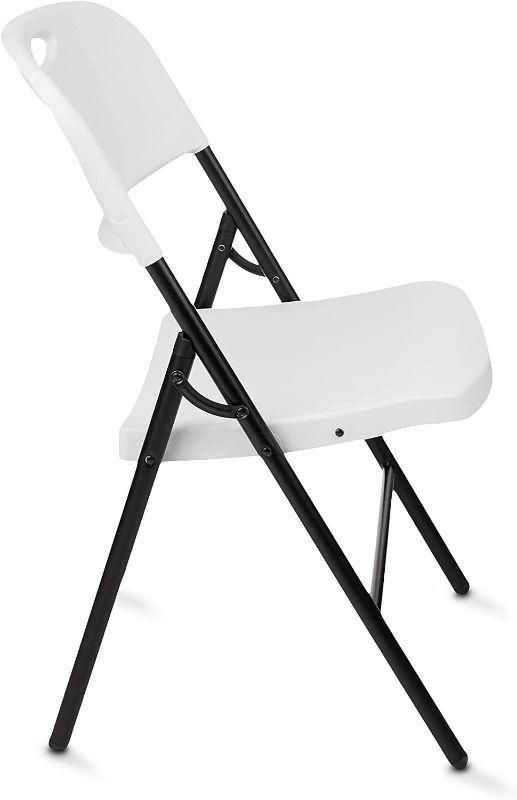 Photo 1 of Amazon Basics Folding Plastic Chair with 350-Pound Capacity  White----------minor use cleaning needed ----
