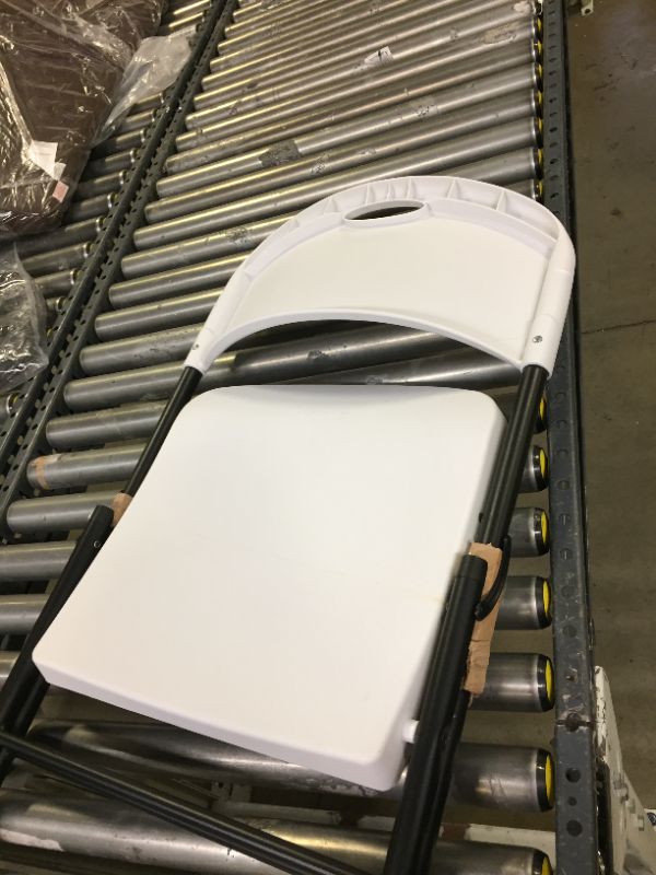 Photo 1 of Amazon Basics Folding Plastic Chair with 350-Pound Capacity  White----------minor use cleaning needed ----
