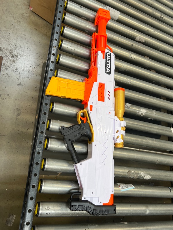 Photo 2 of Nerf Ultra Pharaoh Blaster with Premium Gold Accents, 10-Dart Clip,  Bolt Action, Compatible Only with Nerf Ultra Darts
NO DARTS ONLY THE WEAPON AND CLIP.