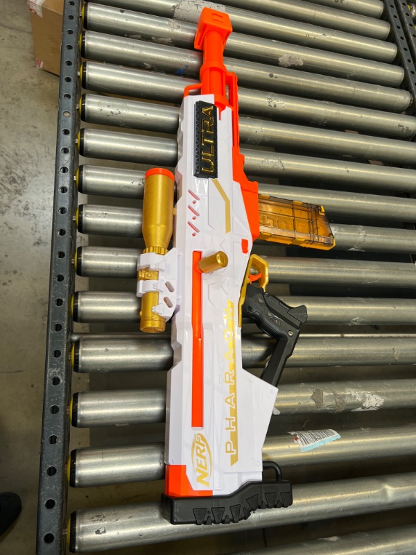 Photo 3 of Nerf Ultra Pharaoh Blaster with Premium Gold Accents, 10-Dart Clip,  Bolt Action, Compatible Only with Nerf Ultra Darts
NO DARTS ONLY THE WEAPON AND CLIP.