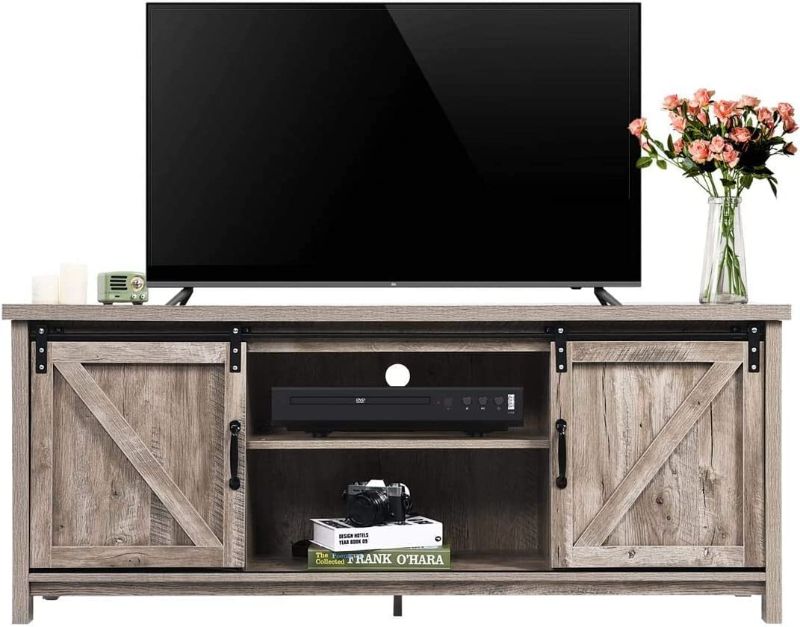 Photo 1 of Farmhouse TV Stand for TVs Up to 65 Inch, Entertainment Center with Barn Door Media TV Console Table Floor Storage Cabinet Living Room Bedroom, Wash Grey-----HARDWARE MISSING 
