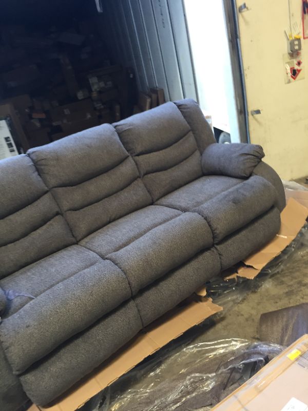 Photo 7 of Clearance Tulen Gray Dual Reclining Sofa --------THERE IS A GREASE SPOT THAT NEEDS CLEANING --------
