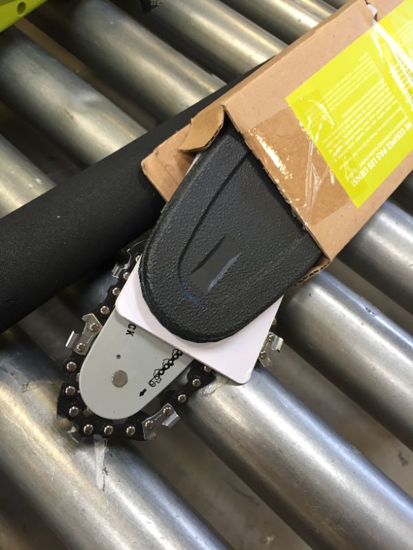 Photo 1 of Sun Joe SWJ806E 8-Inch 8.0 Amp 2-in-1 Convertible Pole Chain Saw, Green & Fiskars 91095935J---MINOR USE IF USED AT ALL 
