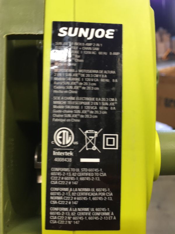 Photo 2 of Sun Joe SWJ806E 8-Inch 8.0 Amp 2-in-1 Convertible Pole Chain Saw, Green & Fiskars 91095935J---MINOR USE IF USED AT ALL 
