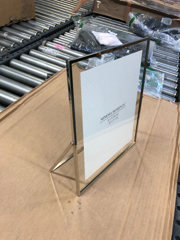 Photo 1 of 8"x10" glass picture frame with its own stand 