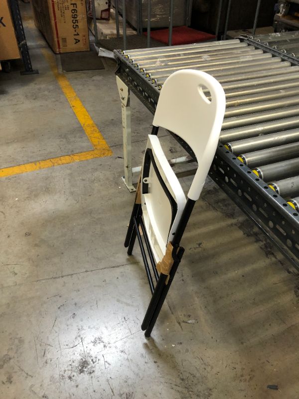Photo 3 of Amazon Basics Folding Plastic Chair with 350-Pound Capacity -1