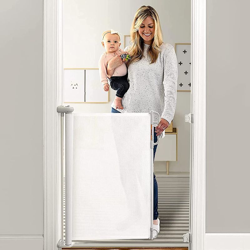 Photo 1 of Momcozy Retractable Baby Gate, 33" Tall, Extends up to 55" Wide, Child Safety Baby Gates for Stairs, Doorways, Hallways, Indoor, Outdoor
