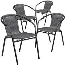 Photo 1 of Flash Furniture 4 Pack Black Rattan Indoor-Outdoor Restaurant Stack Chair