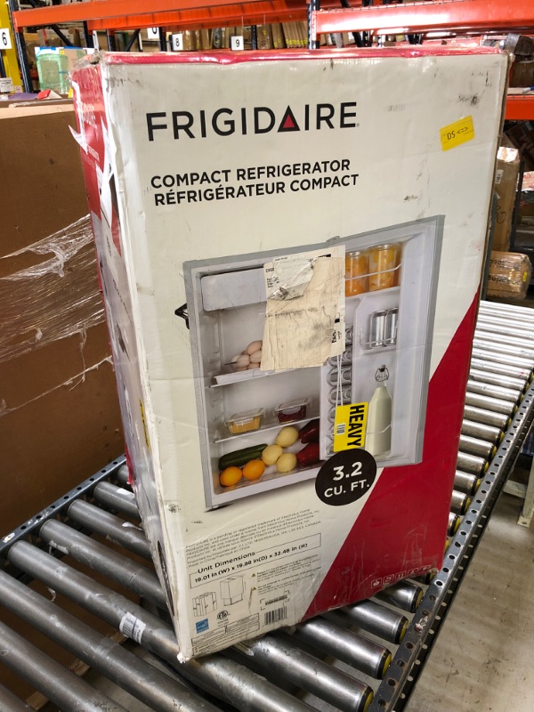 Photo 2 of Frigidaire EFR376-WHITE 3.2 Cu Ft White Retro Bar Fridge with Side Bottle Opener
