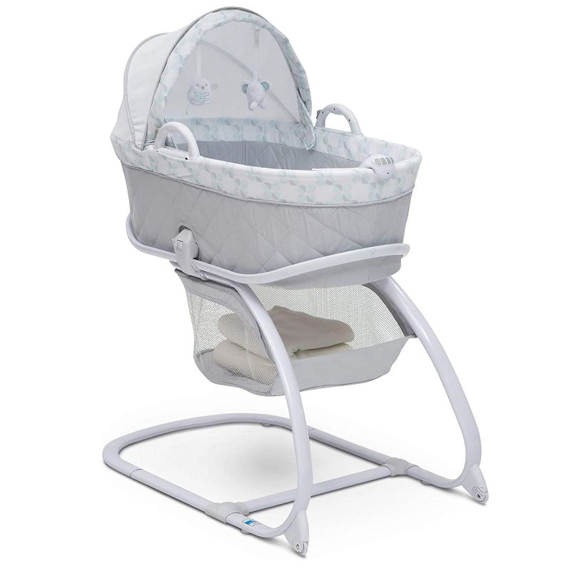 Photo 1 of Delta Children Deluxe 2-in-1 Moses Bedside Bassinet Portable Crib, Windmill
