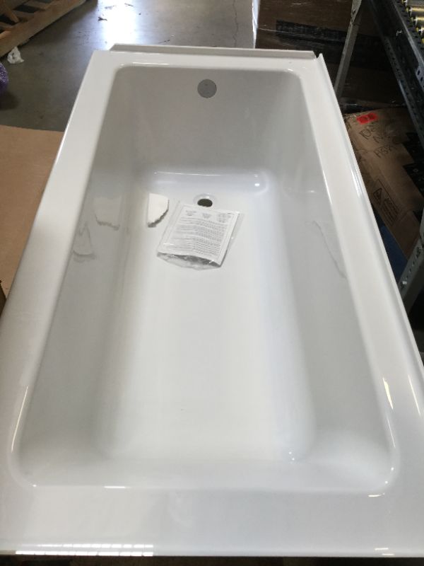 Photo 2 of American Standard Studio Studio 60x30-inch Integral Apron Bathtub - Left Drain = damage on 2 corners 