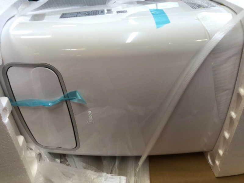 Photo 1 of Midea 10,000 BTU ASHRAE (5,800 BTU SACC) Portable Air Conditioner, Cools up to 200 Sq. Ft., Works as Dehumidifier & Fan, Control with Remote, Amazon Alexa & Google Assistant
