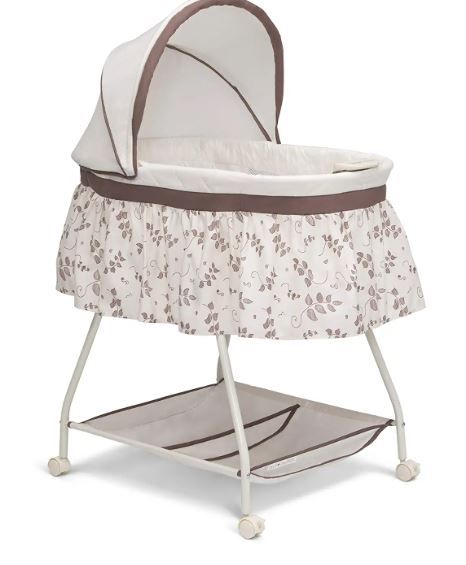 Photo 1 of Delta Children Deluxe Sweet Beginnings Bedside Bassinet - Portable Crib with Lights and Sounds, Falling Leaves
