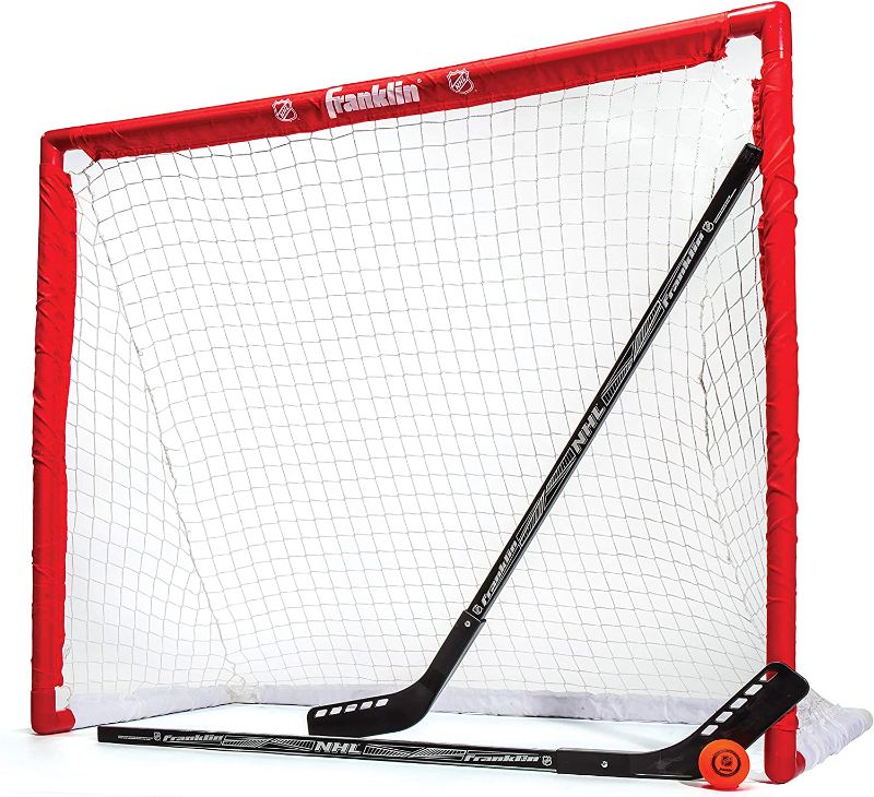 Photo 1 of Franklin Sports NHL Youth Street Hockey Set - (2) Kids Junior Hockey Sticks, PVC Goal + Roller Hockey Ball Included - Indoor + Outdoor Net - 46"
