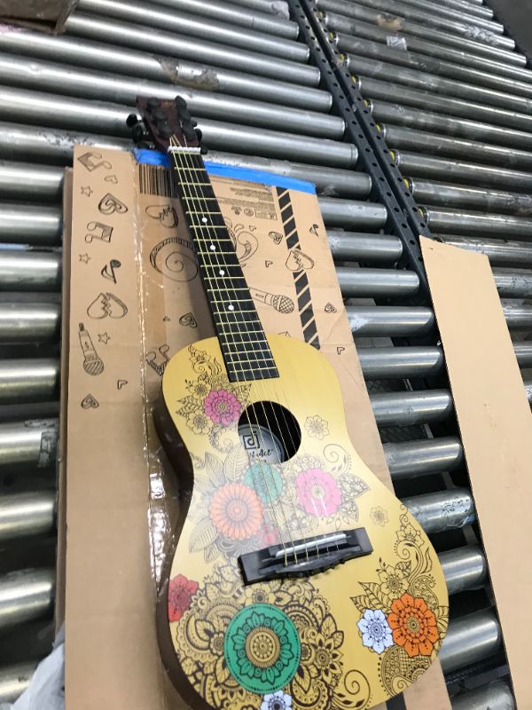 Photo 1 of First Act Acoustic Guitar, 30 Inch - Top Features Flower Design - Brass Acoustic Guitar Strings, Tuning Gear, String Post Covers, Steel-Reinforced Neck, Strap Buttons – Musical Instruments
