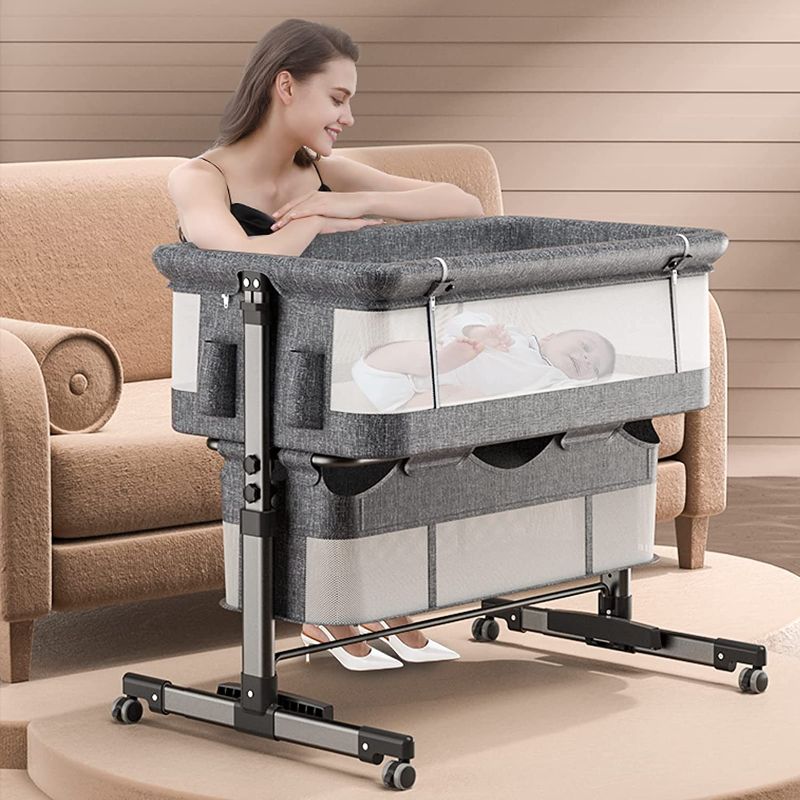 Photo 1 of Portable Crib, Infant Master Bedside Bassinet, Portable Travel Crib with 5 Gears Height Adjustable, Fold-able Baby Bed, bassinets for Newborn 2022 New, Grey
