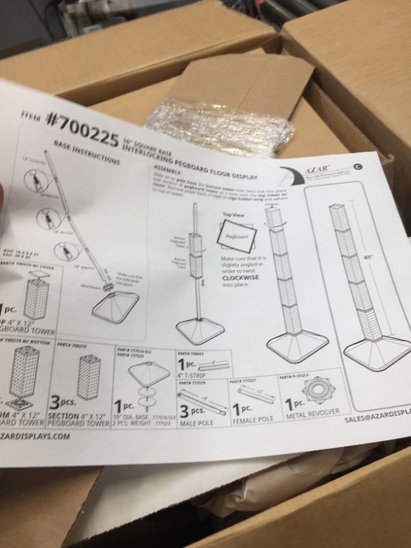 Photo 5 of 16 " Square base interlocking pegboard floor display 